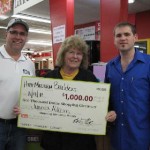 Bob Connell, Juanita Allcorn winner of $1000.00 Shopping Spree , and Gentry Hipp