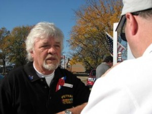 Ed Welsh (Son inlaw of Laynie Sutterfield) and a Vietnam Veteran talks with Bob Connell