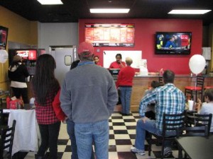 Folks check out the menu