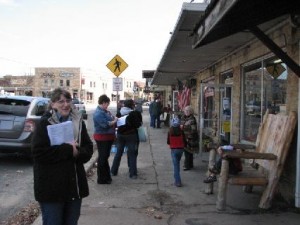 Lori from the Stone County Leader seen checking out the deals on the square