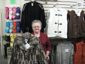 Ruth shows the coat that was given away the winner was  Debra Kirk of Mountain View