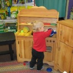 The little ones love the Play Kitchen at Laura's The little ones love the Play Kitchen at Laura's
