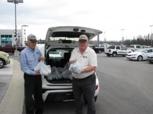 Fred and Rich take in a donation