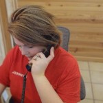 Jennifer takes calls (Handheld) Jennifer takes calls