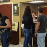 More folks talk about the deals (Handheld) More folks talk about the deals