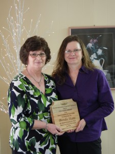 Tom Biggs Recipient Brenda Mans presented the top region award from Cathy Drew, Executive Director (Brenda Tourism Award)