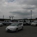 Folks circle through the parking lot for a parking spot