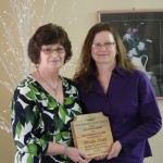 Tom Biggs Recipient Brenda Mans presented the top region award from Cathy Drew, Executive Director (Brenda Tourism Award)