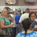 Folks enjoy the Grand re-opening of Yoders