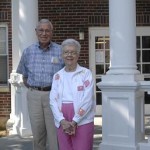 Topeka, Kan., residents Cliff and Mary Lou Heckathorn stand June 29 in front of Cathcart Hall, a women's dorm at Harding University that was named after Mary Lou's great aunt, Florence Cathcart. The Heckathorns traveled to Searcy to visit Harding for the first time Thursday and Friday.