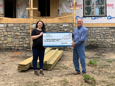 Habitat for Humanity Shannon Haney and First Community Bank’s Tim Haunert